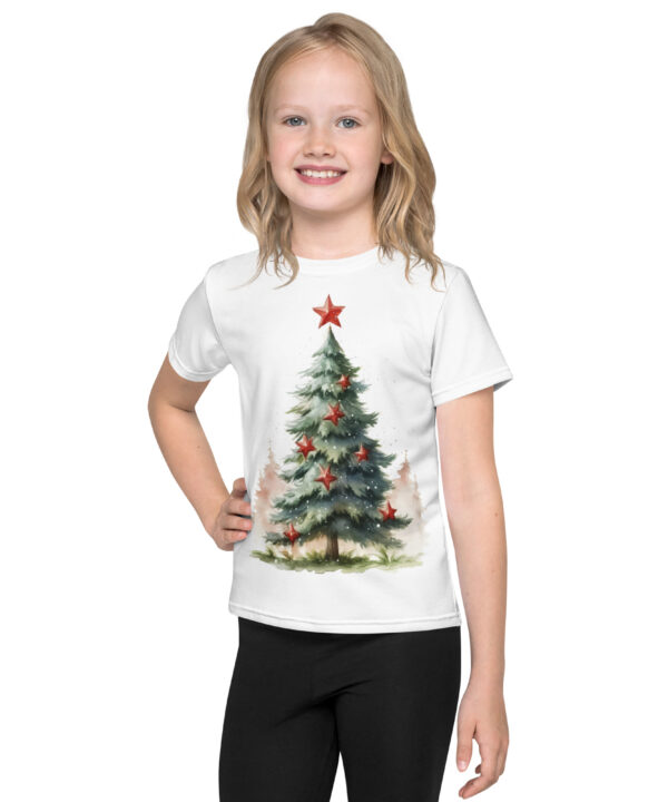 Smiling girl wearing a kids Christmas tree t-shirt with a red star design β festive holiday tee by Printivoo