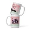 Stacked personalized coffee mugs with pink, mint watercolor bands and Arabic/English names
