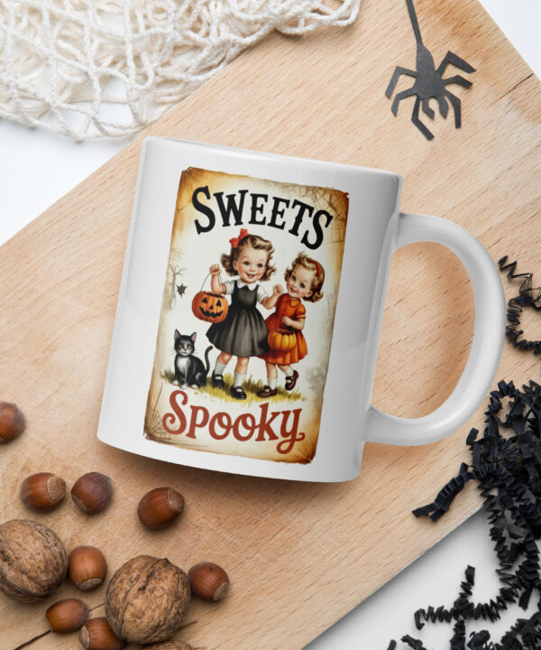 Sweets & Spooky retro Halloween mug featuring two vintage girls and a black cat