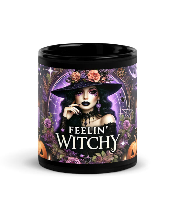 Feelin Witchy black glossy mug with witch and pumpkin Halloween design