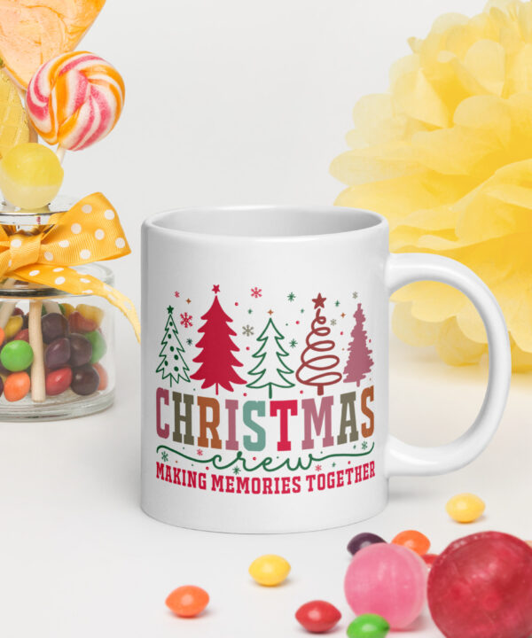 White ceramic Christmas mug with colorful “Christmas Crew – Making Memories Together” design