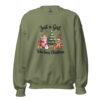 Olive green Christmas sweatshirt with Just a Girl Who Loves Christmas graphic.