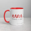 Red interior coffee mug with Hana Peace & Joy text.
