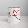 White and pink Rana script coffee mug studio shot.