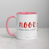 White and pink Noor Radiant Light script coffee mug.
