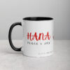White ceramic HANA Peace & Joy coffee mug.