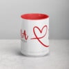 White Rana coffee mug with red heart design.