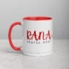 White Rana coffee mug with red trim and text.