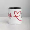 White Rana coffee mug with red heart graphic on light surface.