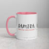 White and pink Samira coffee mug with evening companion script.