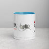 White and blue Samira coffee mug with heart graphics.