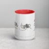 Red interior white coffee mug with friendship hearts design.